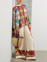 Pantalones anchos con cintura elástica y estampado floral exquisito